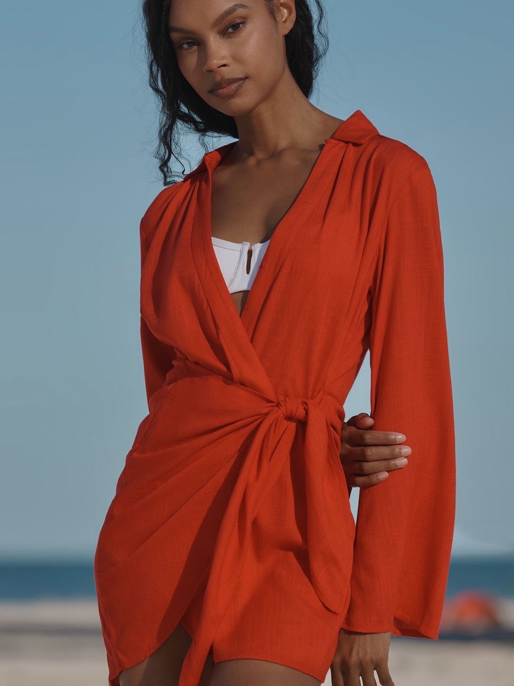 LSPACE Las Palmas long sleeve wrap mini dress